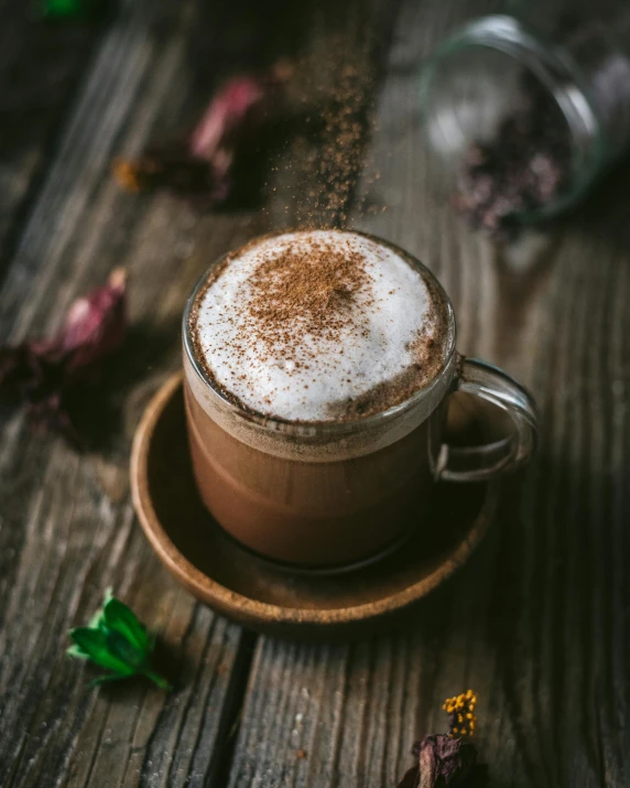 a cup of coffee sitting on top of a wooden table, profile image, powder, square, spicy