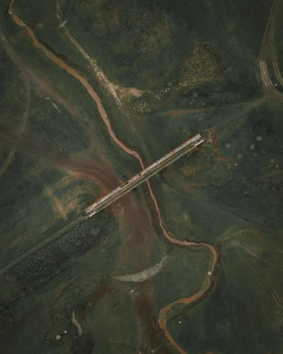 an aerial view of a bridge over a river, by Attila Meszlenyi, unsplash contest winner, land art, military base, steppe, runway, 15081959 21121991 01012000 4k