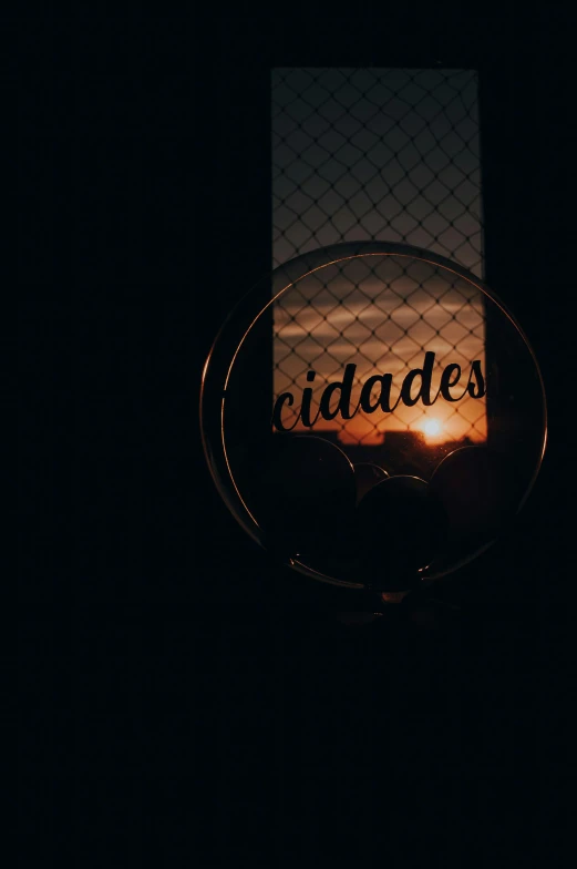 a close up of a street light with a sunset in the background, an album cover, inspired by Elsa Bleda, verdadism, inside a glass jar, andres rios, ((portrait)), large eddies