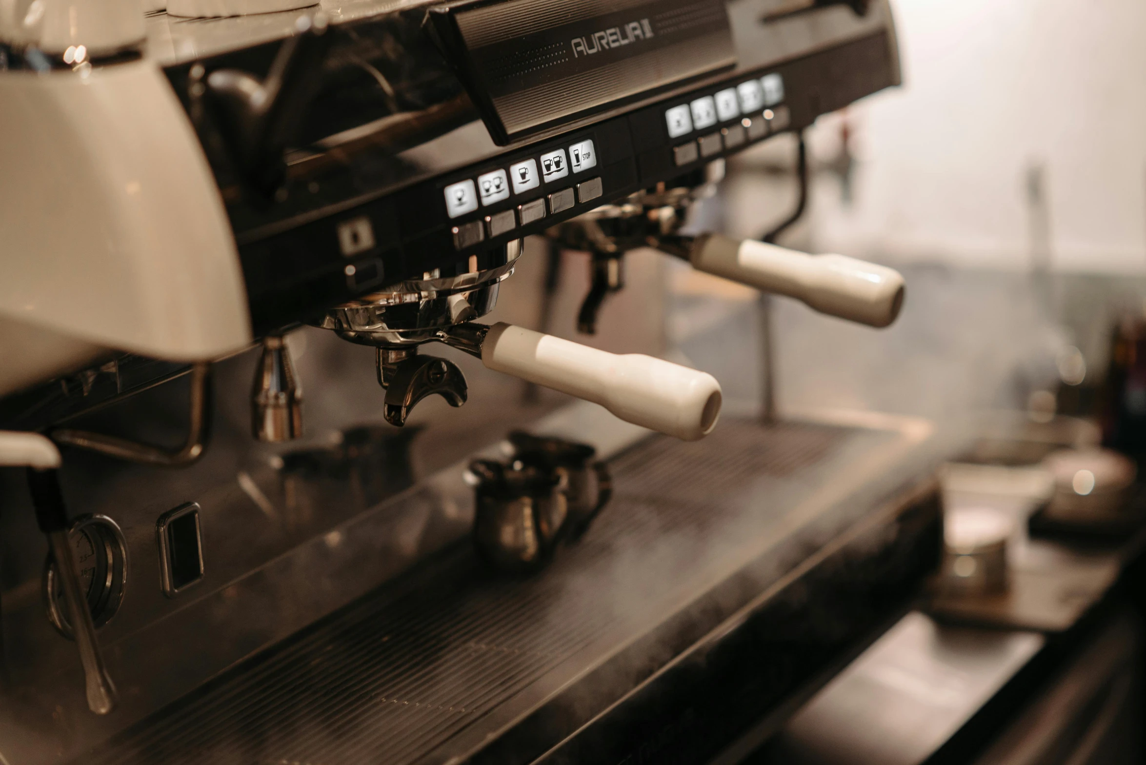 a close up of a coffee machine on a counter, by Nick Fudge, unsplash, multiple stories, levers, lachlan bailey, in a row