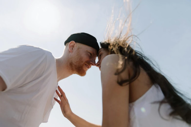 a man and a woman standing next to each other, pexels contest winner, happening, ( redhead, playful vibe, halo over her head, 15081959 21121991 01012000 4k