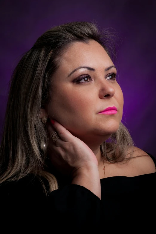 a woman posing in front of a purple background, professional photo-n 3, dramatic lighting !n-9, fernanda suarez, double chin