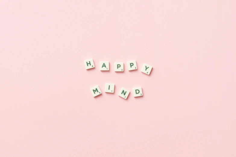 the word happy mind spelled with wooden letters on a pink background, by Emma Andijewska, trending on unsplash, minimalism, planner stickers, animation, made of all white ceramic tiles, featuring pink brains