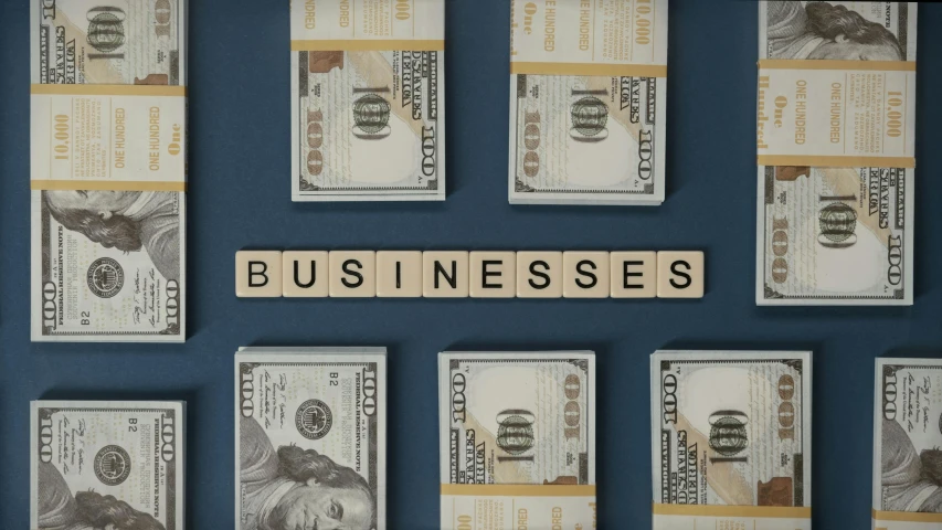 the word business spelled in scrabbles on a blue background, a photo, trending on unsplash, dollar bills, panels, avatar image, alessio albi