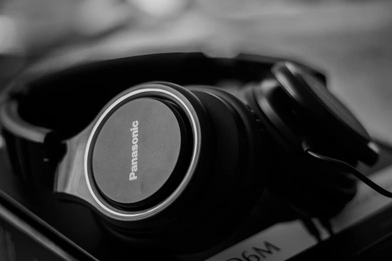 a black and white photo of a pair of headphones, precisionism, panasonic, gaming, photograph taken in 2 0 2 0, technologies
