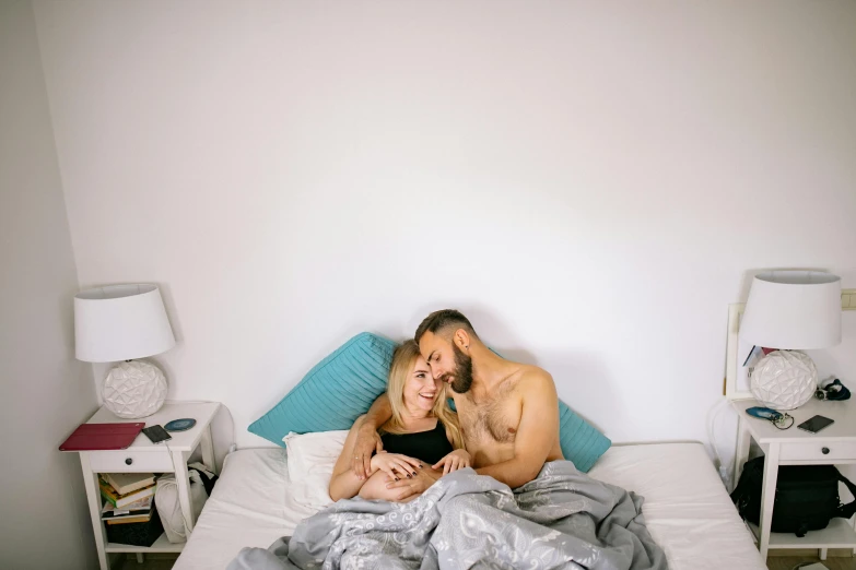 a man and woman laying in bed next to each other, a photo, by Matija Jama, lgbtq, manly, profile image, cuddling