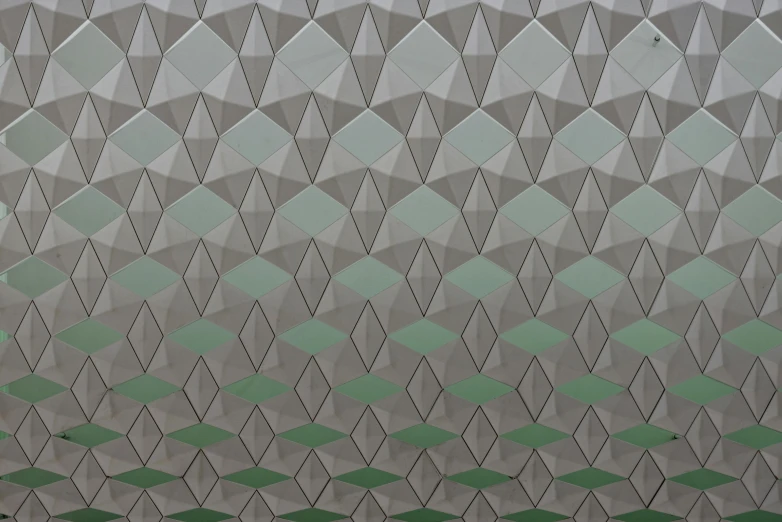 a close up of a wall with a clock on it, a raytraced image, inspired by Bridget Riley, trending on polycount, op art, metallic green armor, grey and silver, flat triangles, gradient and patterns wallpaper