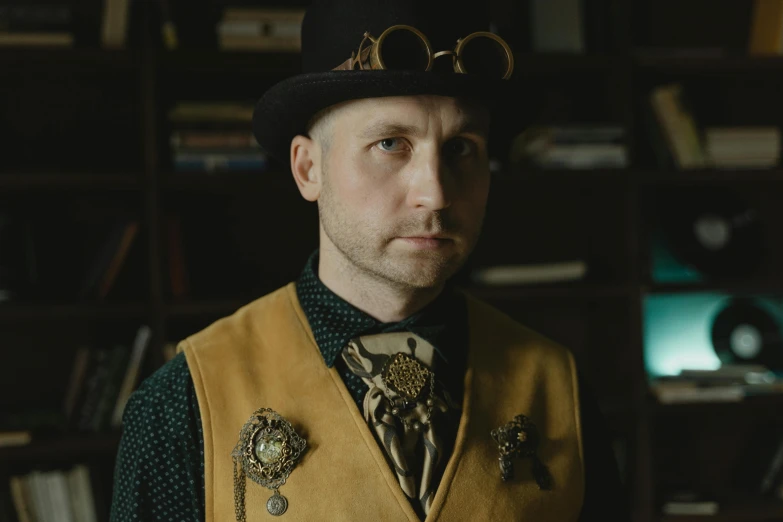 a man wearing a top hat and vest, a character portrait, by Ryan Pancoast, unsplash, renaissance, golden turquoise steampunk, vintage color photo, wearing a steampunk sari, dressed like a cleric