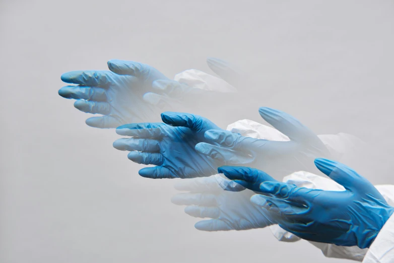 a person in a white lab coat and blue gloves, by Jessie Algie, pexels contest winner, plasticien, floating bodies, on grey background, blueshift render, synthetic materials