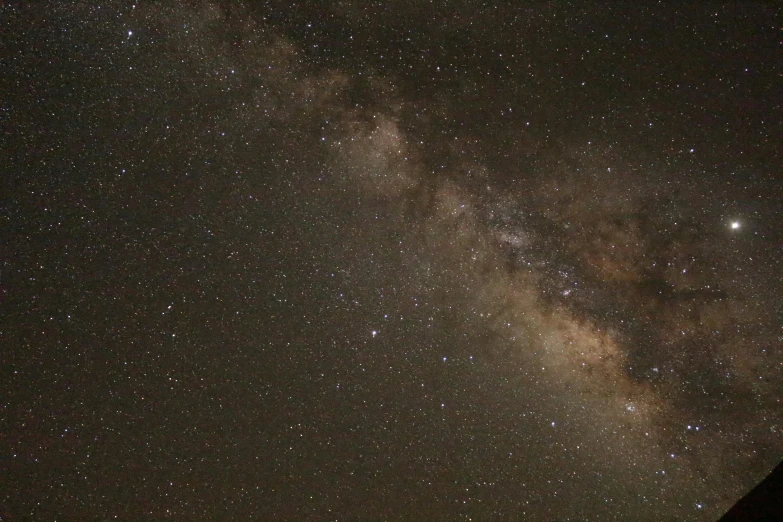 the milky shines brightly in the night sky, by Neil Blevins, pexels, brown, medium detail, grey, infinity