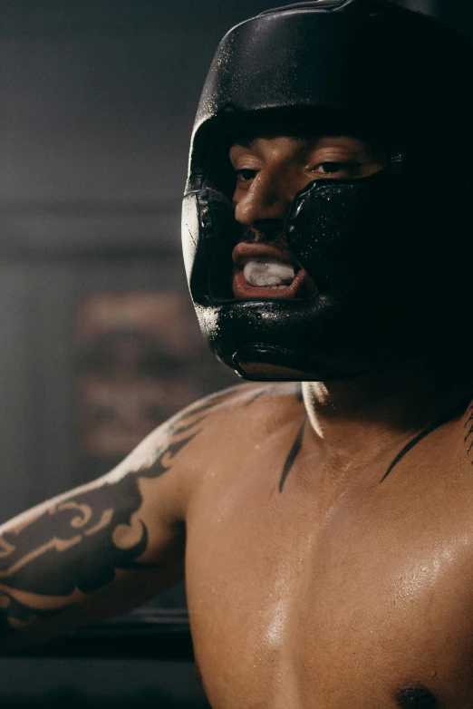 a close up of a person in a boxing ring, a tattoo, inspired by Kanō Hōgai, renaissance, black metal face paint, video still, samoan features, ( ( theatrical ) )