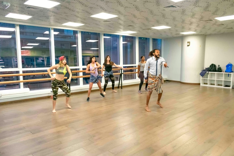 a group of people in a dance class, by Ella Guru, arabesque, urban music studio, ameera al taweel, maintenance photo