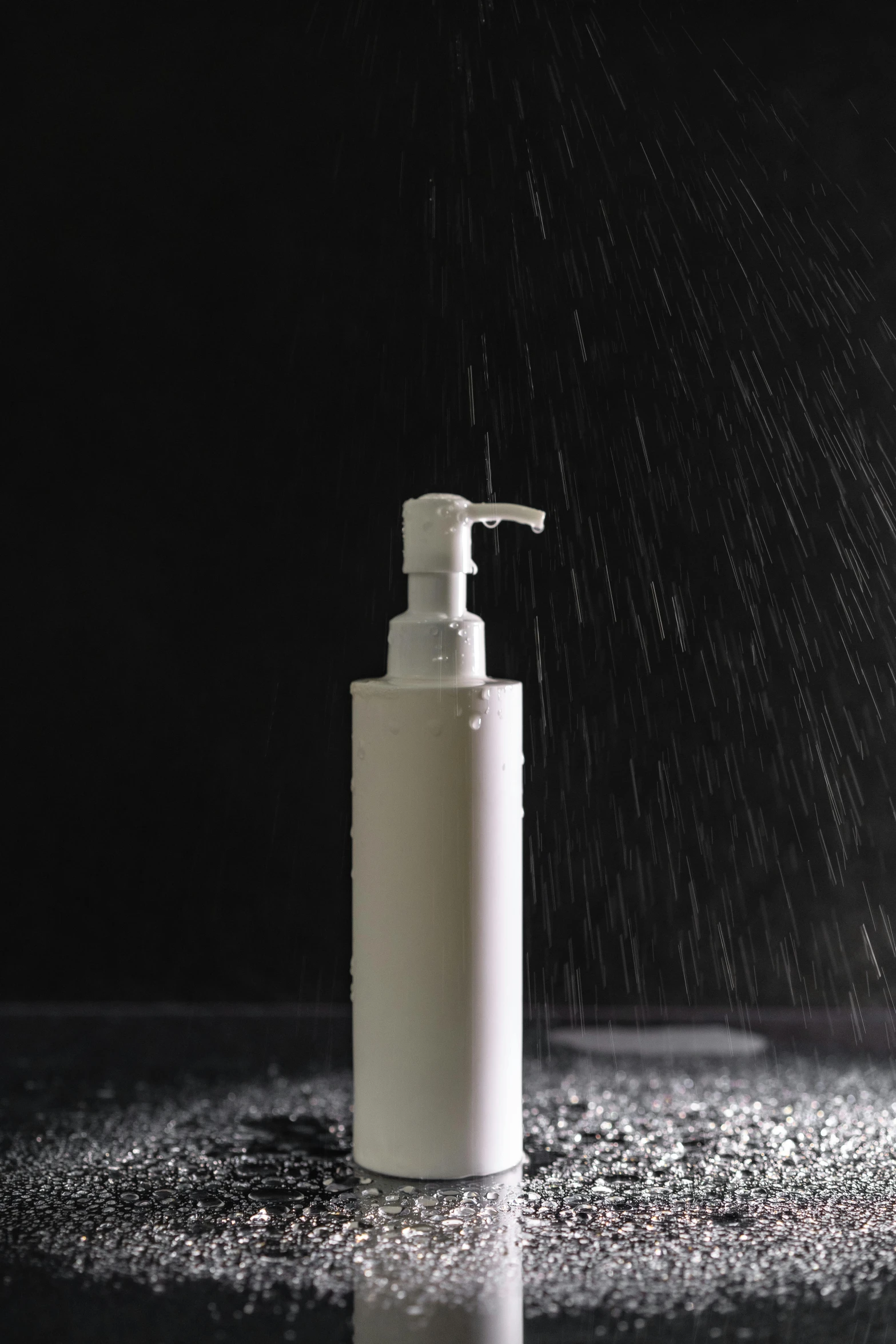 a bottle of lotion sitting on top of a table, unsplash, conceptual art, rain splashing, white plastic, product, thinning hair