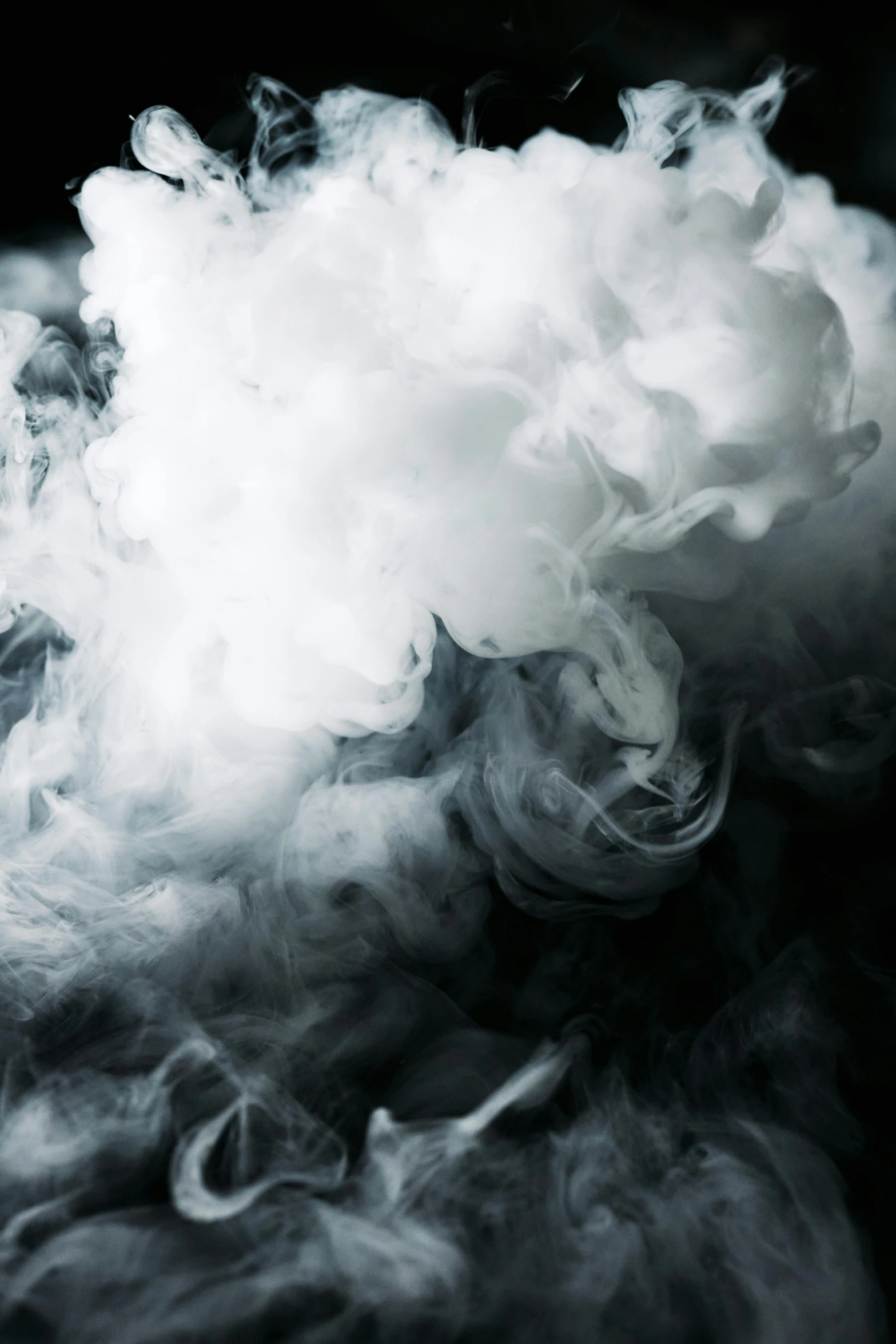 a cloud of smoke on a black background, a black and white photo, inspired by Kim Keever, pexels contest winner, closeup portrait, tie-dye, instagram post, bubbling liquids