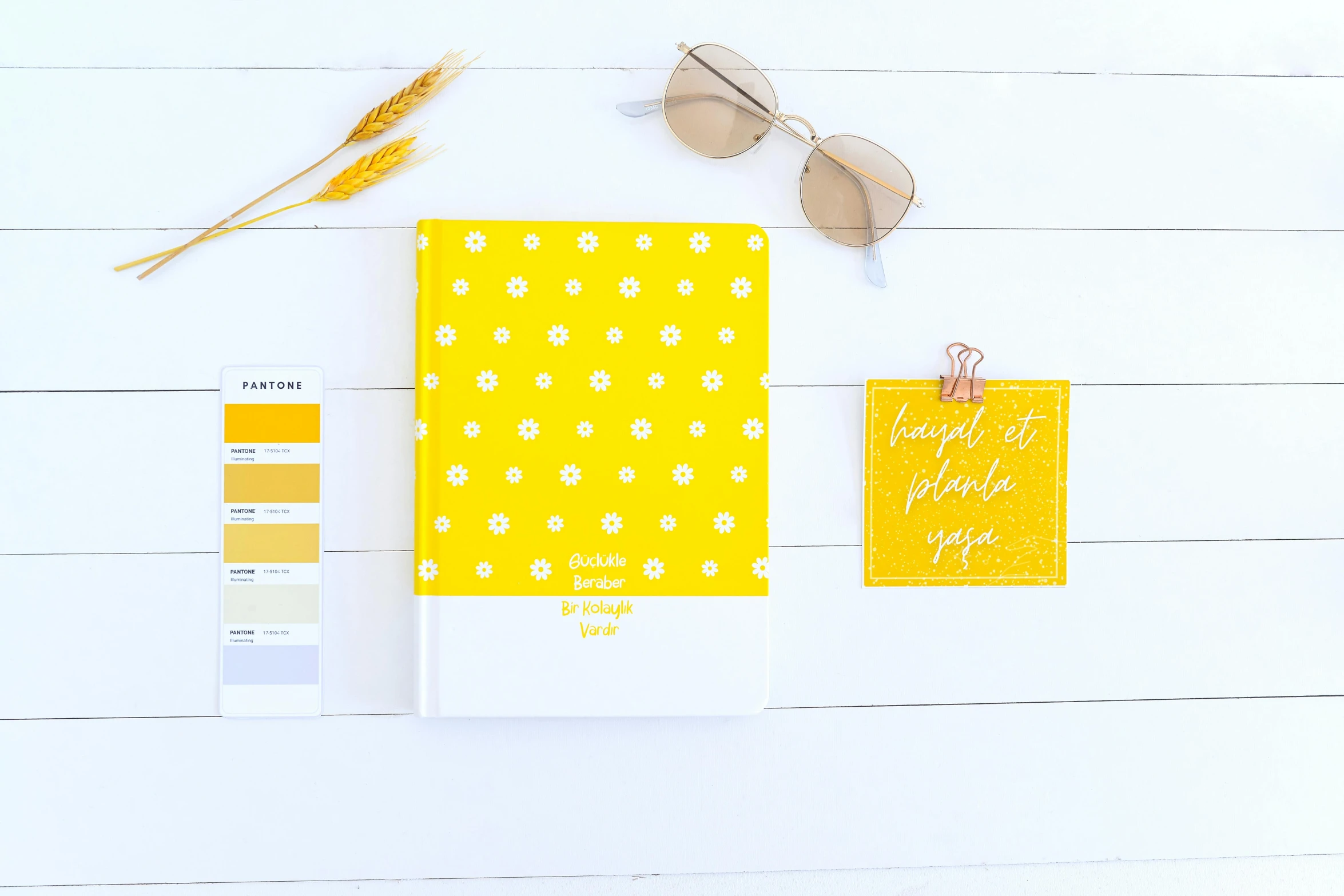 a yellow notebook sitting on top of a white table, inspired by Sun Long, flatlay book collection, flower power, polka dot, thumbnail