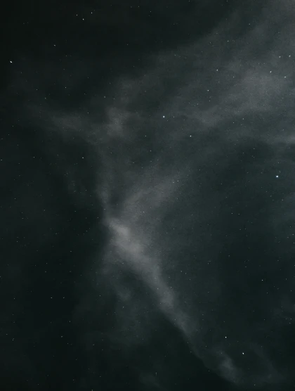 a black and white photo of some clouds, an album cover, by Adam Marczyński, unsplash contest winner, light and space, stars and nebula, white fog painting, background ( dark _ smokiness ), star sky