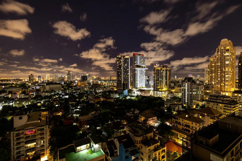 an aerial view of a city at night, pexels contest winner, thailand, city apartment, square, low iso