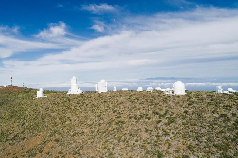 a group of telescopes sitting on top of a hill, quixel megascans, white, satellite imagery, instagram photo