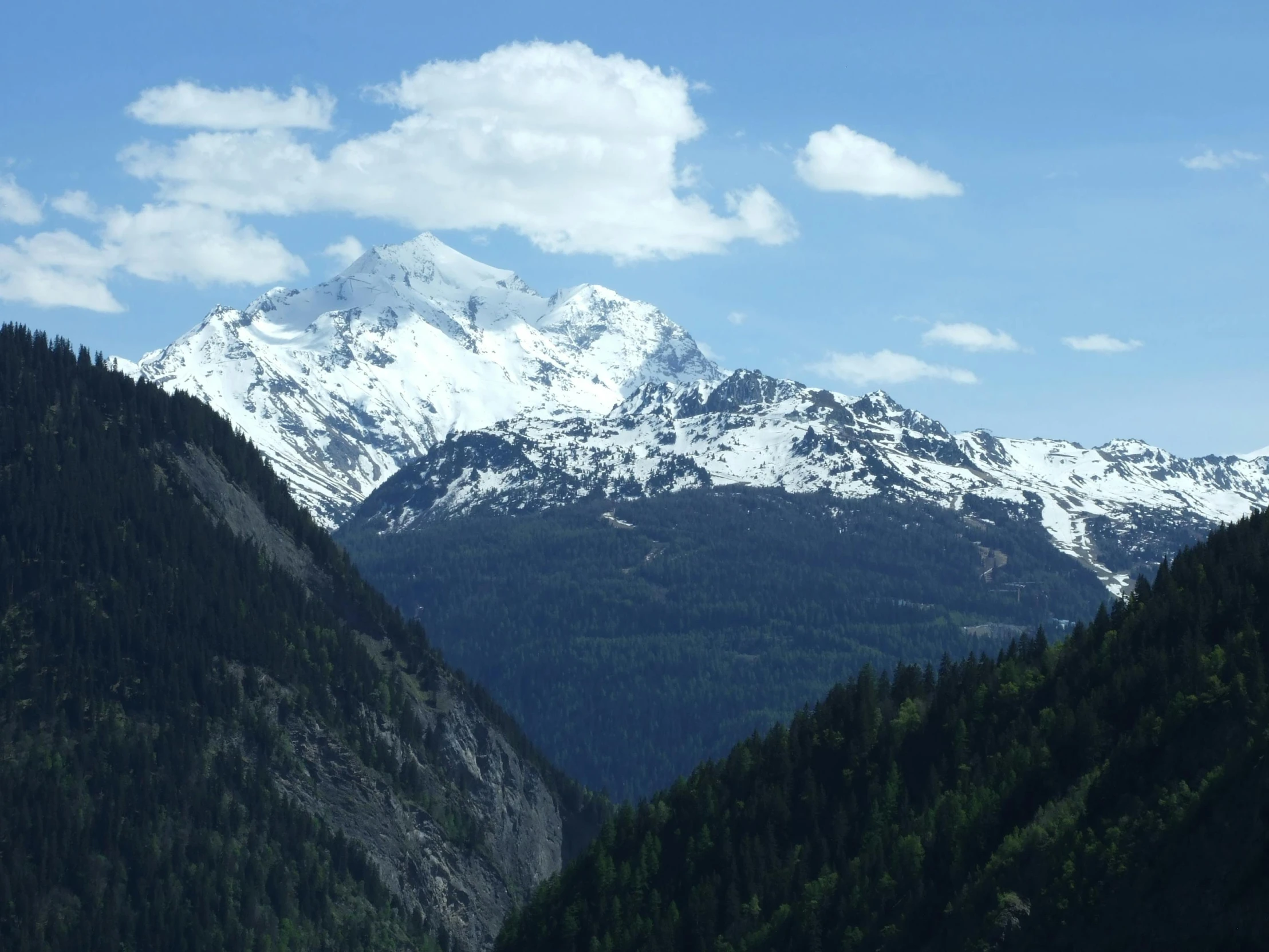 the mountains are covered in snow on a sunny day, pexels contest winner, les nabis, herzog de meuron, thumbnail, no cropping, view from a distance