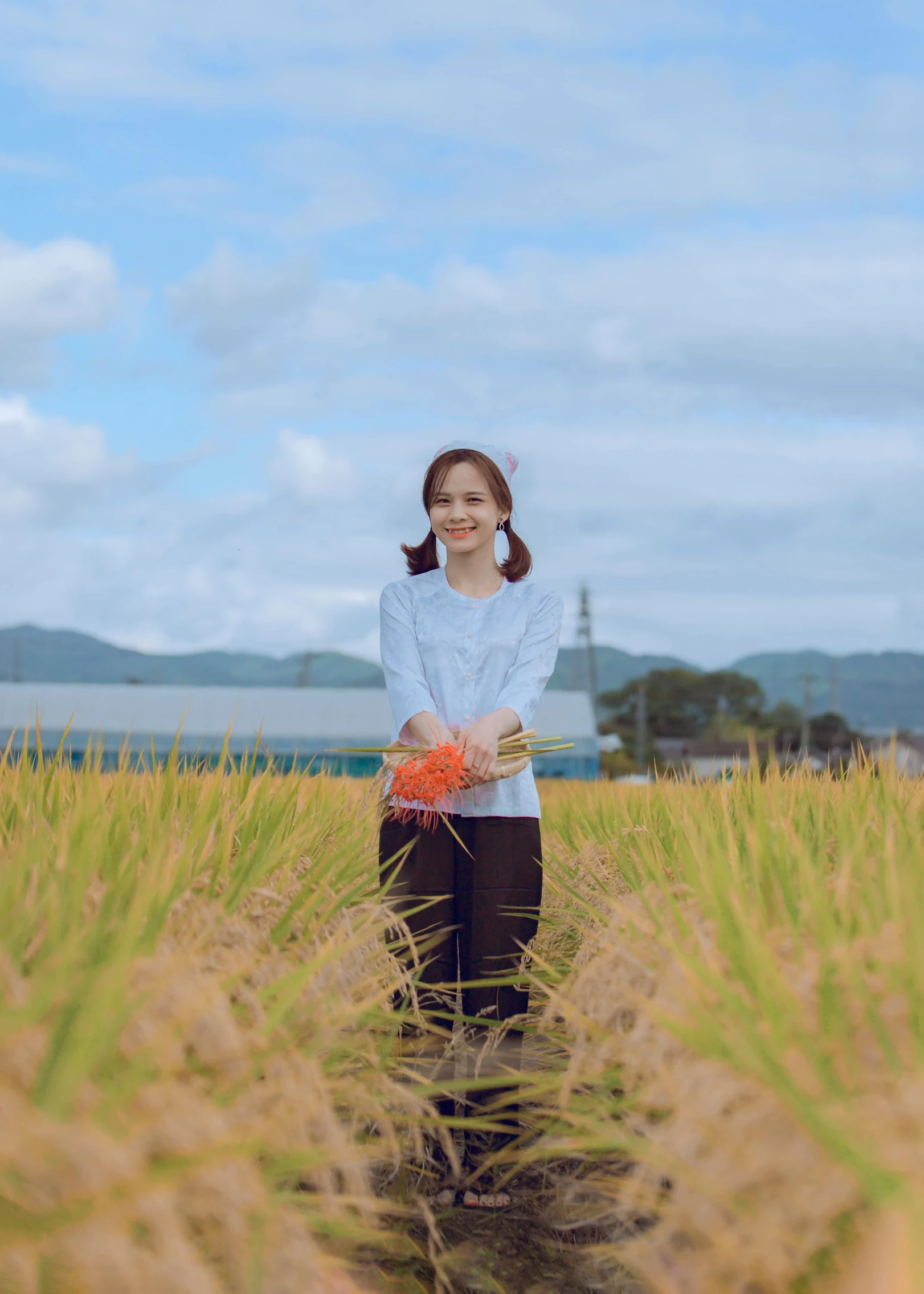 a woman standing in a rice field holding a carrot, unsplash, shin hanga, avatar image, advertising photo, taiwan, ( ( theatrical ) )