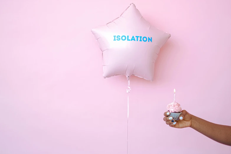 a person holding a cupcake and a balloon that says isolation, pastel pink concrete, in a chill position, star born, inflatable