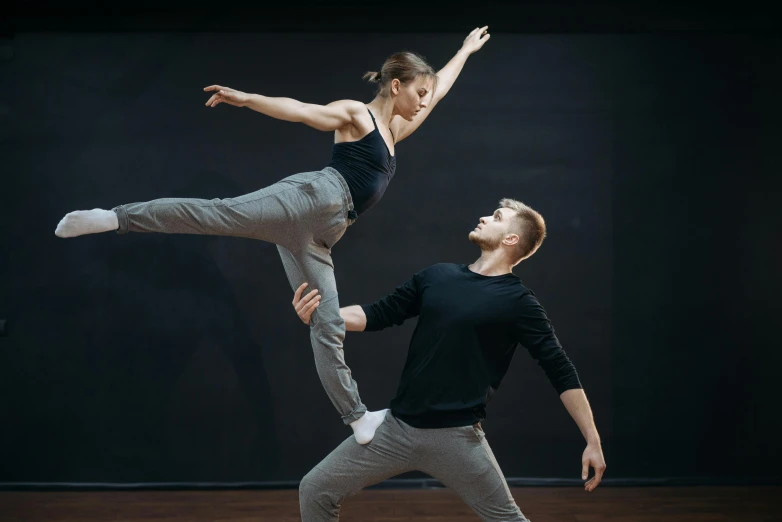 a male dancer and a female dancer in a black leo leo leo leo leo leo leo leo leo leo leo leo leo leo leo, by Matija Jama, pexels contest winner, arabesque, youtube thumbnail, ilya golitsyn, full body 8k, action pose reference