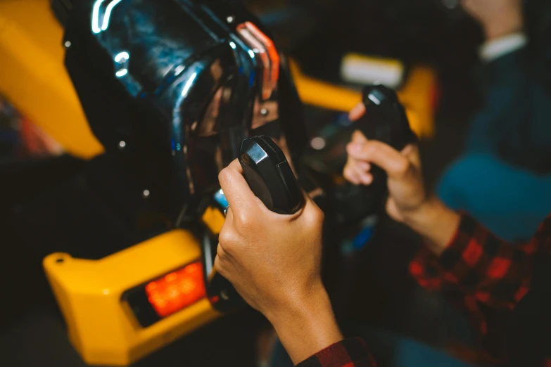 a close up of a person holding a camera, bumper cars, avatar image, arcade, high quality product image”