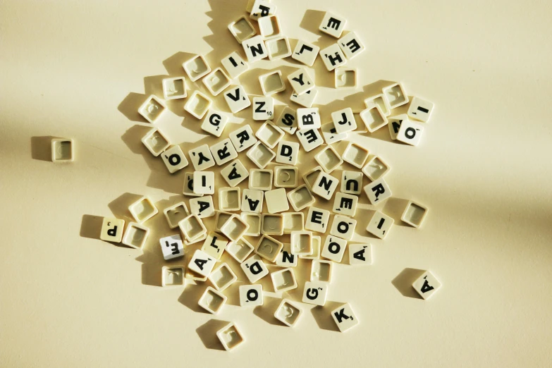a pile of letters sitting on top of a table, by Emma Andijewska, unsplash, letterism, videogame, ivory, 15081959 21121991 01012000 4k, squares