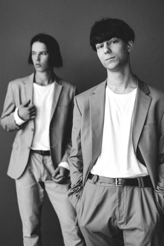 a couple of men standing next to each other, model エリサヘス s from acquamodels, non binary model, wearing suits!, tommy 1 6 years old