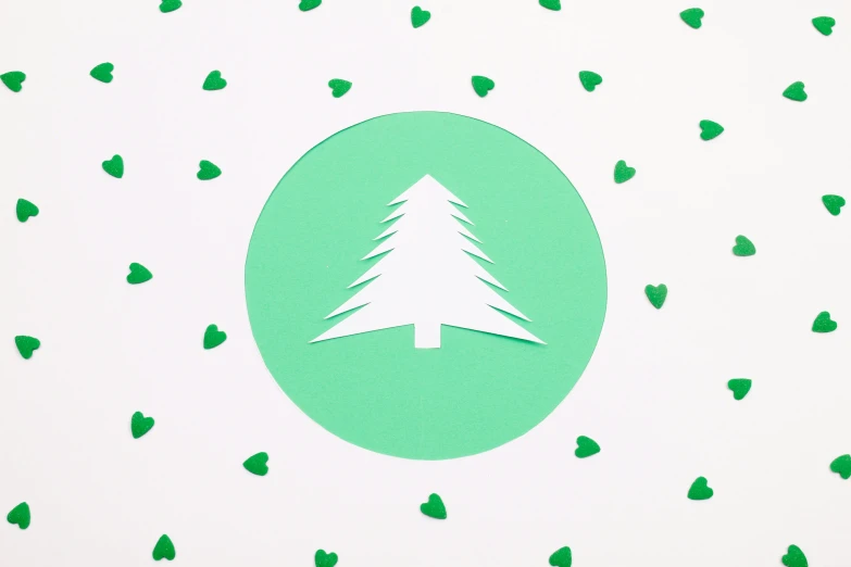 a paper cut christmas tree surrounded by green hearts, an album cover, inspired by Ernő Grünbaum, trending on pexels, hurufiyya, circular logo, detail on scene, mint, material design