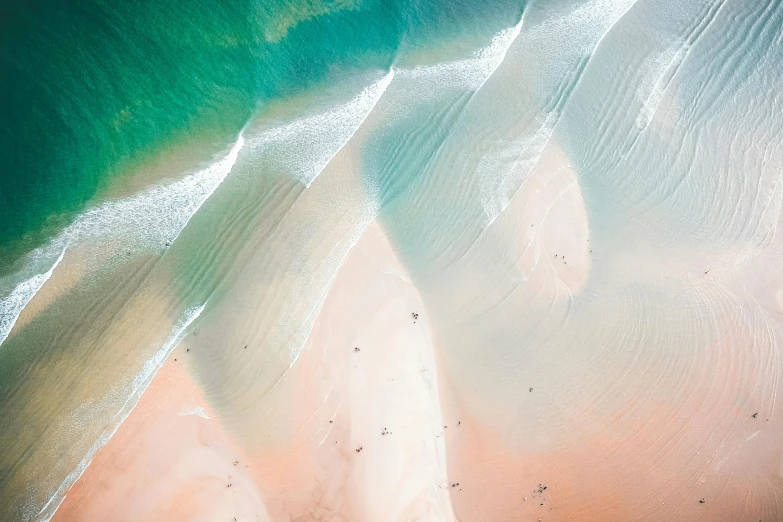 a group of people riding surfboards on top of a sandy beach, unsplash contest winner, minimalism, aerial iridecent veins, pink white and green, gold coast australia, bird's eye