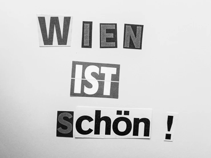 a black and white photo of a sign that says when ist schon, by Micha Klein, instagram, viennese actionism, paper collage, school, saatchi art, teaser