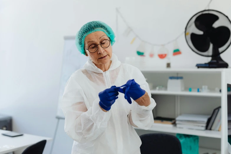 a woman in a white lab coat and blue gloves, pexels contest winner, an elderly, te pae, awkward situation, clean medical environment