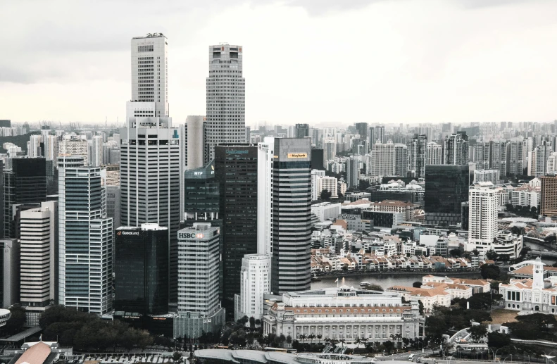 a black and white photo of a city, pexels contest winner, the singapore skyline, white buildings with red roofs, high rise buildings, wide high angle view