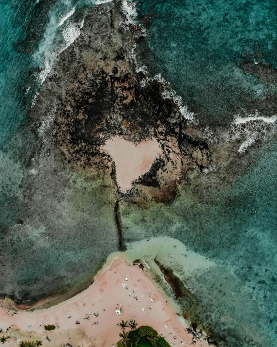 a large body of water next to a sandy beach, an album cover, pexels contest winner, heart shaped face, aerial photo, an island made of caviar, unsplash photo contest winner