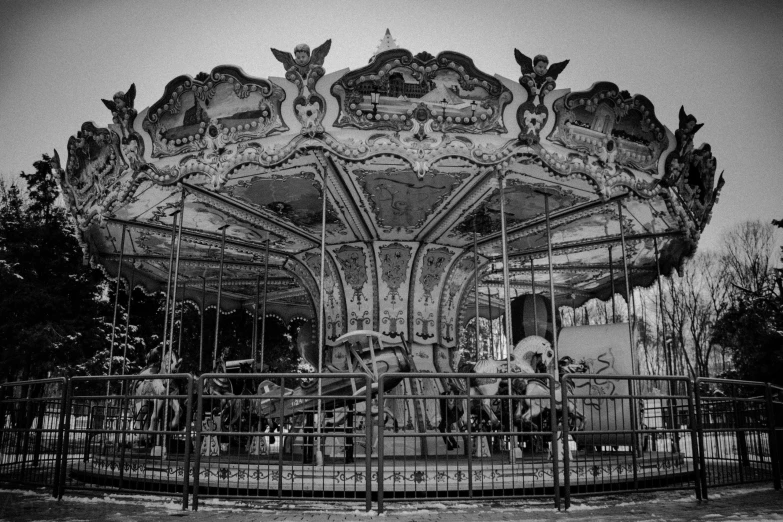 a merry merry merry merry merry merry merry merry merry merry merry merry merry merry merry merry merry, a black and white photo, by Daniel Gelon, pexels contest winner, baroque, carousel, post apocalyptic theme park, 👰 🏇 ❌ 🍃, taken in 1 9 9 7
