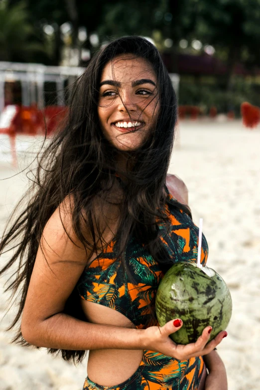 a woman in a bikini holding a watermelon on a beach, pexels contest winner, with long black hair, patterned clothing, headshot, brazil