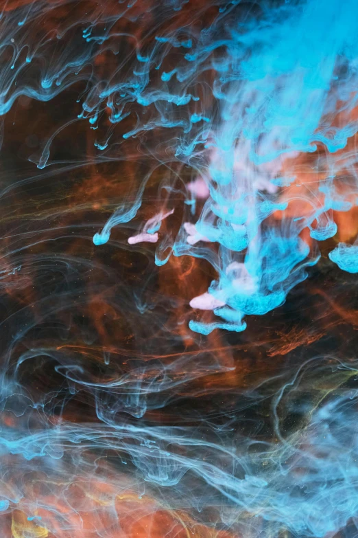 a close up of a cell phone with smoke coming out of it, an abstract drawing, inspired by Kim Keever, unsplash contest winner, red and cyan ink, blue jellyfish, unsplash 4k, instagram post