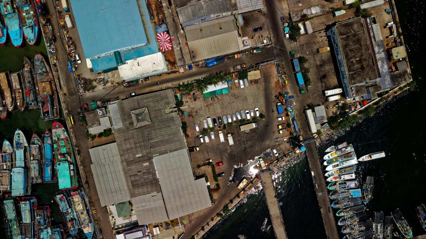 an aerial view of a harbor filled with lots of boats, reddit, warehouses, satellite imagery, ilustration, snapchat photo