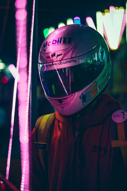 a close up of a person wearing a helmet, inspired by Liam Wong, pexels contest winner, neon operator margot robbie, racecar, lonely rider, reflective suit