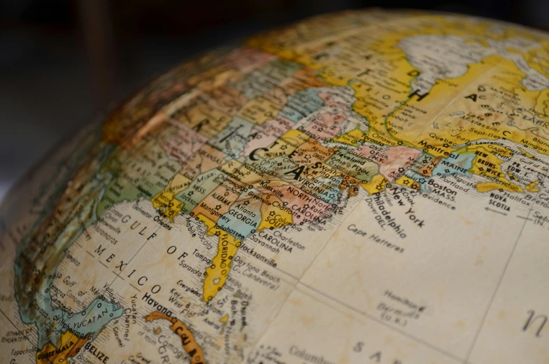 a close up of a globe on a table