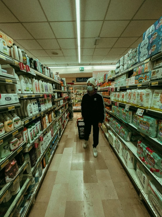 a man is walking down the aisle of a grocery store, an album cover, inspired by Elsa Bleda, pexels contest winner, hyperrealism, ashteroth, ignant, lofi hip hop, sad lonely mellow vibes
