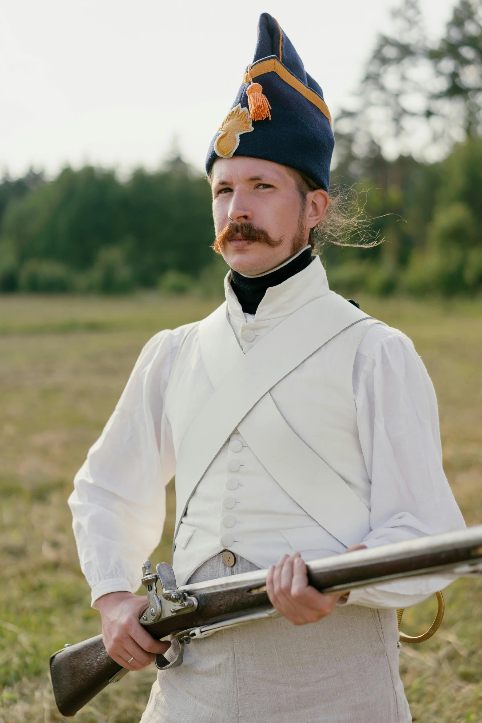 a man in uniform holding a rifle in a field, an album cover, inspired by Carl Gustaf Pilo, unsplash, renaissance, finland, handlebar mustache, white russian clothes, slide show