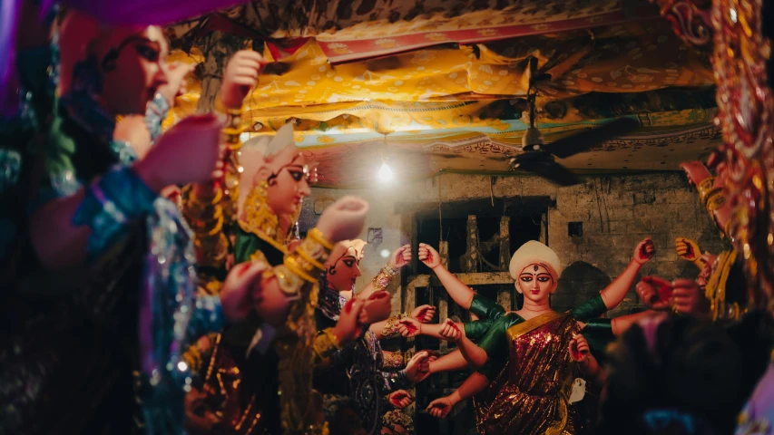 a group of people dancing in a room, pexels contest winner, bengal school of art, traditional makeup, underground scene, thumbnail, avatar image