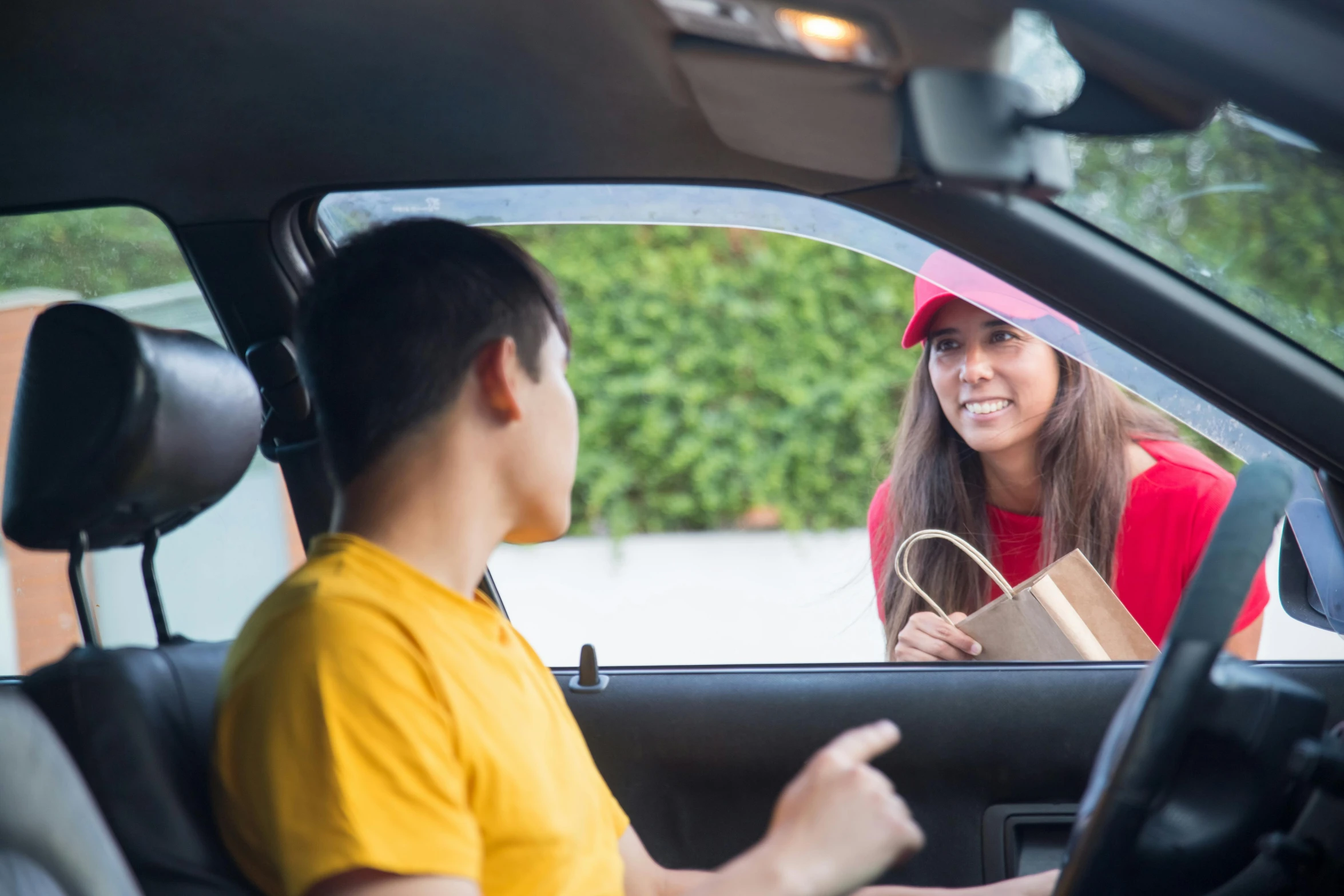 a man and a woman sitting in a car, working at mcdonalds, profile image, delivering mail, square