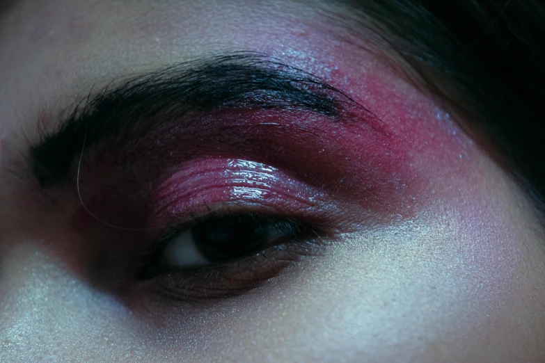 a close up of a woman's eye with pink makeup, an album cover, inspired by Elsa Bleda, trending on pexels, aestheticism, 8 0 s asian neon movie still, alessio albi, dark thick eyebrows, nocturnal palette