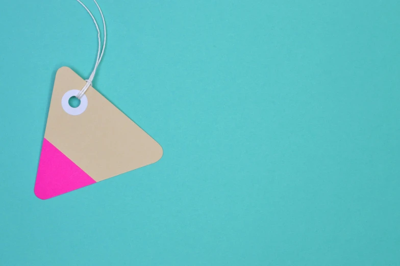 a tag hanging from a string on a turquoise background, inspired by Frederick Hammersley, trending on pexels, neon pink, flat triangles, medical labels, presents