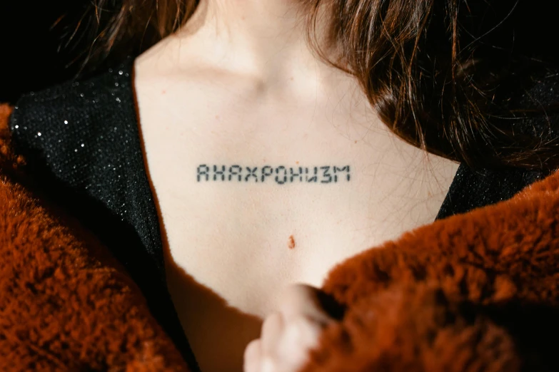 a woman with a tattoo on her chest, a tattoo, by Niko Henrichon, synchromism, trendy typography, adamantium, unsplash transparent, roman shipunov