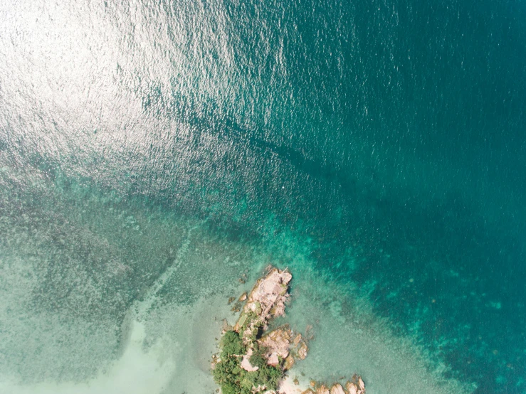 an aerial view of a body of water, a screenshot, pexels contest winner, island background, commercial photo, random background scene, thumbnail