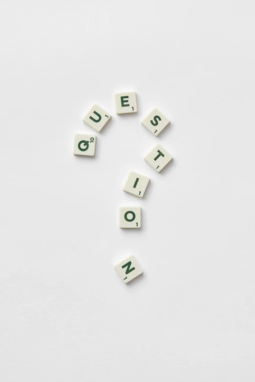 a question sign made out of scrabbles on a white surface, a picture, shutterstock, letterism, quiet intensity, 🦑 design, 2 5 6 x 2 5 6 pixels, owen gent